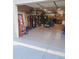 View of a clean garage with ample storage and workspace at 1160 W Ivanhoe St, Chandler, AZ 85224