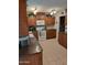 Spacious kitchen with wood cabinets and white appliances at 1160 W Ivanhoe St, Chandler, AZ 85224