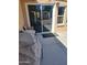 A patio has lots of sunlight and a sliding door to the backyard at 1160 W Ivanhoe St, Chandler, AZ 85224