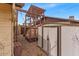 Play area of a backyard featuring a shed, swing set, and jungle gym at 1179 E Cordova Ave, Casa Grande, AZ 85122