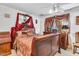 Comfortable bedroom with a wooden sleigh bed and decorative accents at 1179 E Cordova Ave, Casa Grande, AZ 85122