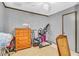 Functional bedroom with workout equipment and a ceiling fan at 1179 E Cordova Ave, Casa Grande, AZ 85122