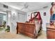 Bedroom featuring a bed, closet and view into an adjacent room at 1179 E Cordova Ave, Casa Grande, AZ 85122