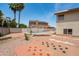 Spacious backyard featuring a pool, decorative checkers, and ample space for outdoor activities at 1203 W Escuda Rd, Phoenix, AZ 85027