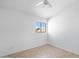 Neutral bedroom features tile floors, window with natural light, and neutral color palette at 1203 W Escuda Rd, Phoenix, AZ 85027