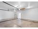 Spacious two-car garage with concrete floors, water heater, and room for storage or a workshop at 1203 W Escuda Rd, Phoenix, AZ 85027