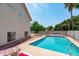 Backyard pool view featuring clear water and lounge chairs for relaxation at 1203 W Escuda Rd, Phoenix, AZ 85027