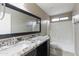 Full bathroom with granite counters and a shower over tub, bright and clean at 2194 N Magdelena Pl, Casa Grande, AZ 85122