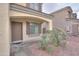 Charming covered front porch with a desert landscape at 2194 N Magdelena Pl, Casa Grande, AZ 85122