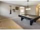 Open game room with neutral colored walls, a billiard table and stylish billiards decor at 2194 N Magdelena Pl, Casa Grande, AZ 85122