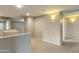 Open hallway with neutral walls, carpeting, and architectural details provides ample space at 2194 N Magdelena Pl, Casa Grande, AZ 85122
