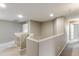 Neutral hallway with neutral walls, carpeted floor, and architectural details provides ample space at 2194 N Magdelena Pl, Casa Grande, AZ 85122