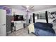 A playful bedroom featuring colorful decor, a television, and a comfortable bed at 2916 N 48Th Ave, Phoenix, AZ 85031