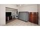 Bedroom featuring tiled floors, furniture and a closet at 2916 N 48Th Ave, Phoenix, AZ 85031