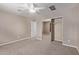Bedroom with carpet, ceiling fan, closet, and neutral walls at 3034 E Turney Ave, Phoenix, AZ 85016