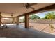Comfortable covered patio area overlooking a gravel backyard at 3034 E Turney Ave, Phoenix, AZ 85016
