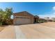 Attractive single-Gathering house with low-maintenance desert landscaping, long driveway, and attached garage at 3034 E Turney Ave, Phoenix, AZ 85016