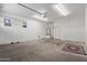 Large, two-car garage with lots of space for storage and parking at 3034 E Turney Ave, Phoenix, AZ 85016