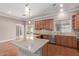 Spacious kitchen features granite countertops, stainless appliances, and an open floor plan at 3034 E Turney Ave, Phoenix, AZ 85016
