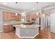 Well-lit kitchen boasts stainless appliances, granite countertops, and a large kitchen island at 3034 E Turney Ave, Phoenix, AZ 85016