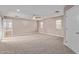 Expansive primary bedroom with neutral carpeting, ceiling fan, and serene natural light at 3034 E Turney Ave, Phoenix, AZ 85016