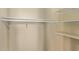 Organized walk-in closet with built-in shelving for efficient storage solutions at 3034 E Turney Ave, Phoenix, AZ 85016