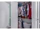 Walk-in closet with ample storage space and shelving, offering organization solutions at 317 E Harwell Rd, Gilbert, AZ 85234