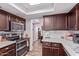 Kitchen featuring stainless steel appliances, white countertops, and subway tile backsplash at 317 E Harwell Rd, Gilbert, AZ 85234