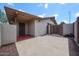 Backyard patio with an outdoor lounge area and brick accents at 322 N Williams St, Mesa, AZ 85203