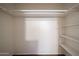Spacious walk-in closet with built-in shelving for optimal storage and organization at 322 N Williams St, Mesa, AZ 85203