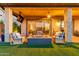 Relaxing outdoor patio featuring comfortable seating and a modern fire pit for cozy evenings at 3408 E Daley Ln, Phoenix, AZ 85050