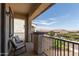 Outdoor balcony with seating area overlooking the neighborhood at 3408 E Daley Ln, Phoenix, AZ 85050