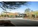 Expansive southwestern architecture features desert landscaping and a covered entry at 3408 E Daley Ln, Phoenix, AZ 85050