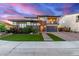 Stunning two-story home featuring a two-car garage, manicured lawn, and charming front entryway at 3408 E Daley Ln, Phoenix, AZ 85050