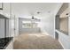 Neutral toned bedroom featuring carpeted floor, ceiling fan, and natural light at 3641 E Park Ave, Phoenix, AZ 85044