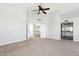 Large bedroom featuring neutral carpet, ceiling fan, and convenient access to bathroom at 3641 E Park Ave, Phoenix, AZ 85044