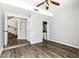 Bright bedroom with stairway access, attached bathroom, and modern flooring at 3641 E Park Ave, Phoenix, AZ 85044