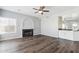 Inviting living room with a fireplace, bar area, and ample natural light at 3641 E Park Ave, Phoenix, AZ 85044
