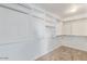 Bright walk-in closet featuring open shelving, hanging rods, and neutral carpet at 3641 E Park Ave, Phoenix, AZ 85044
