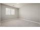 Bright bedroom with carpeted floor and natural lighting at 3983 E Melinda Dr, Phoenix, AZ 85050