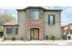 This lovely home boasts a stone-accented entry, neutral tones, and neat landscaping for a welcoming facade at 3983 E Melinda Dr, Phoenix, AZ 85050