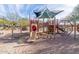 Neighborhood playground with multiple play structures and swings, creating an engaging recreational area at 3983 E Melinda Dr, Phoenix, AZ 85050