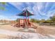 Community playground featuring slides and a sunshade, offering a fun outdoor space for children at 3983 E Melinda Dr, Phoenix, AZ 85050