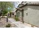 Street view showcasing the home's appealing architecture, complemented by mature trees and manicured landscaping at 3983 E Melinda Dr, Phoenix, AZ 85050
