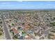 Aerial view of a single Gathering home in a neighborhood with the surrounding mountain ranges in the distance at 405 W Monte Way, Phoenix, AZ 85041