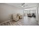 Spacious living room featuring comfortable seating and modern ceiling fan at 405 W Monte Way, Phoenix, AZ 85041