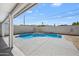 A beautiful pool with a concrete patio sits nestled behind a block wall, creating a private backyard oasis at 405 W Monte Way, Phoenix, AZ 85041