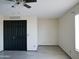Bright room with closet, fan and light, and window at 43241 W Kristal Ln, Maricopa, AZ 85138