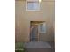 Image of the covered front entrance with desert landscaping surrounding the walkway to the front door at 43241 W Kristal Ln, Maricopa, AZ 85138