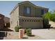 Two-story home featuring an attached two-car garage and easy-care desert landscaping in a suburban setting at 43241 W Kristal Ln, Maricopa, AZ 85138
